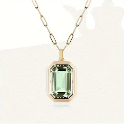 Colar dourado com pendente retangular e cristal verde claro - Dorelia