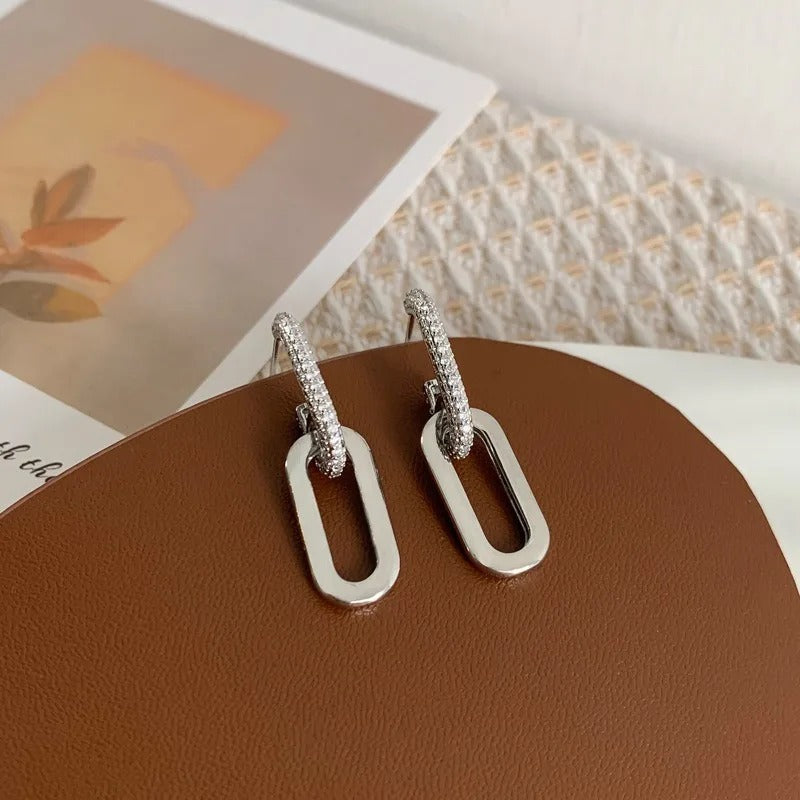 Brincos em forma de gota com elos brilhantes - Luminara