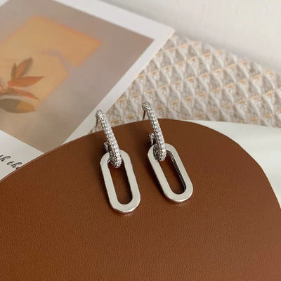 Brincos em forma de gota com elos brilhantes - Luminara
