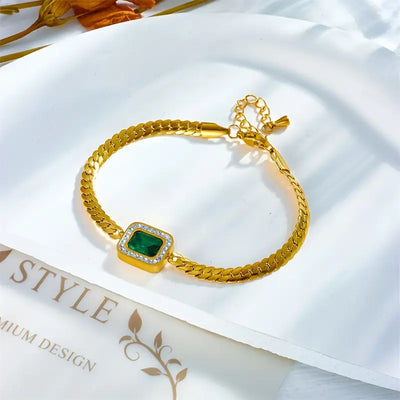 Pulseira dourada com cristal verde retangular - Liriel