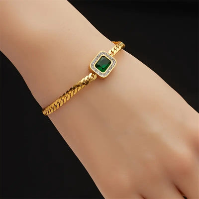 Pulseira dourada com cristal verde retangular - Liriel