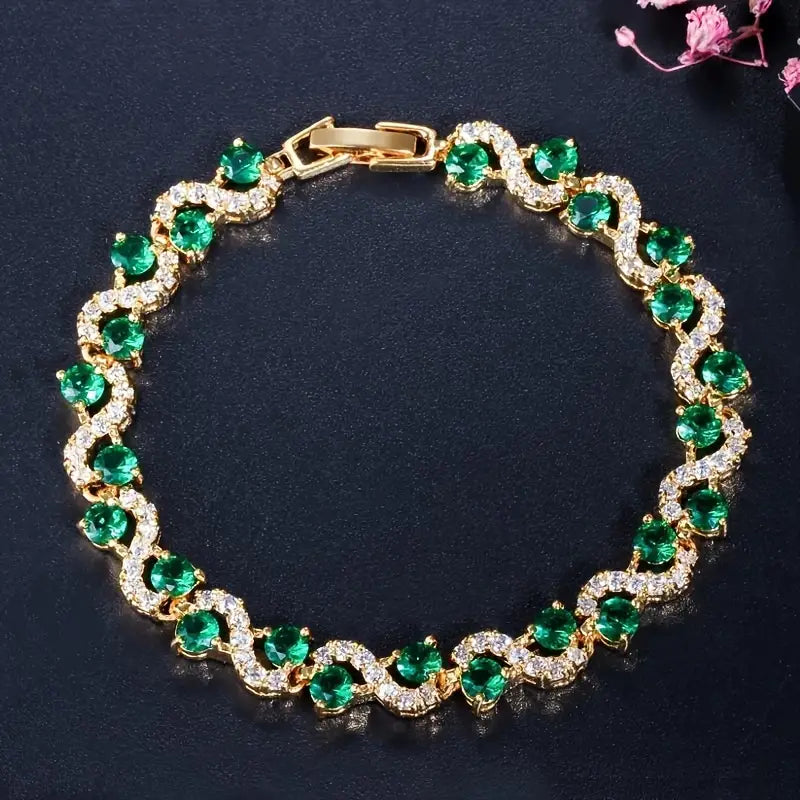 Pulseira dourada com cristais verdes e zircões - Malisse