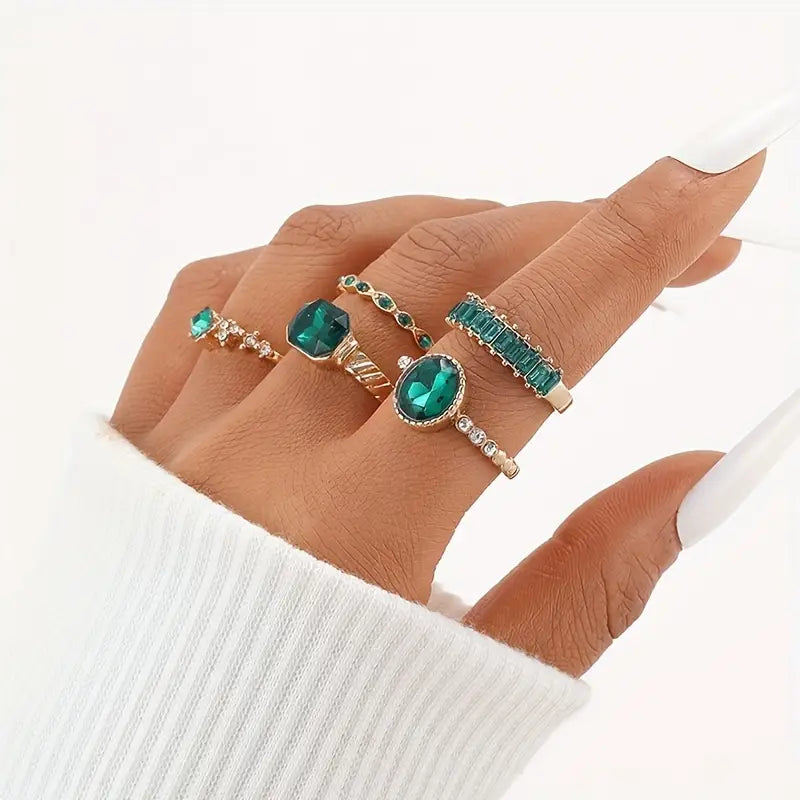 Conjunto de anéis de ouro com pedras de corte esmeralda - Jade
