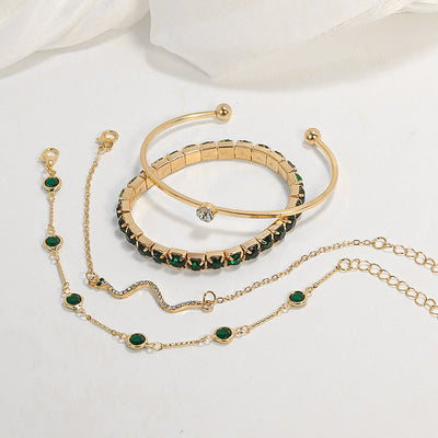 Conjunto de pulseiras douradas com pormenores verdes - Smeralda