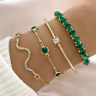 Conjunto de pulseiras douradas com pormenores verdes - Smeralda