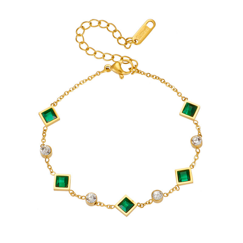Pulseira dourada com cristais verdes e brancos - Ravenna