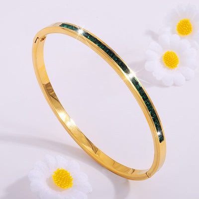 Pulseira rígida dourada com cristais verdes - Mirella
