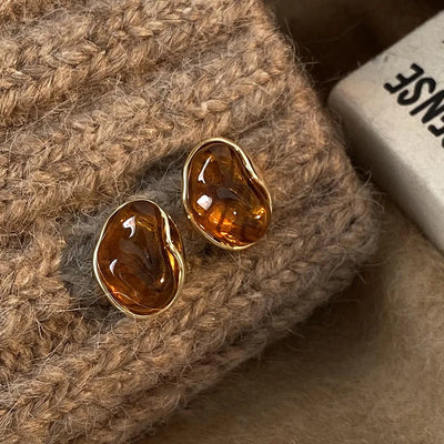 Brincos de cravo Amber Melt - Sabine