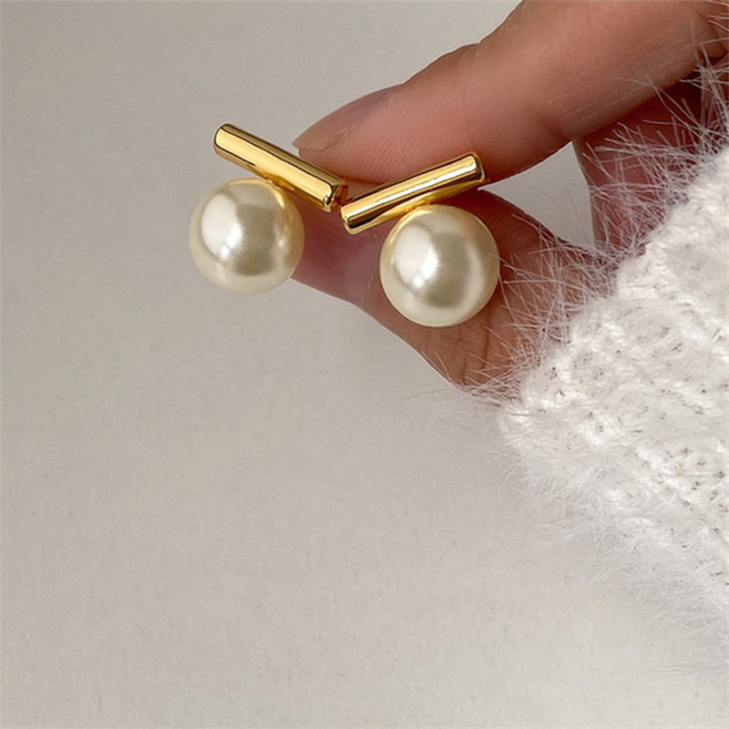 Brincos com pérolas