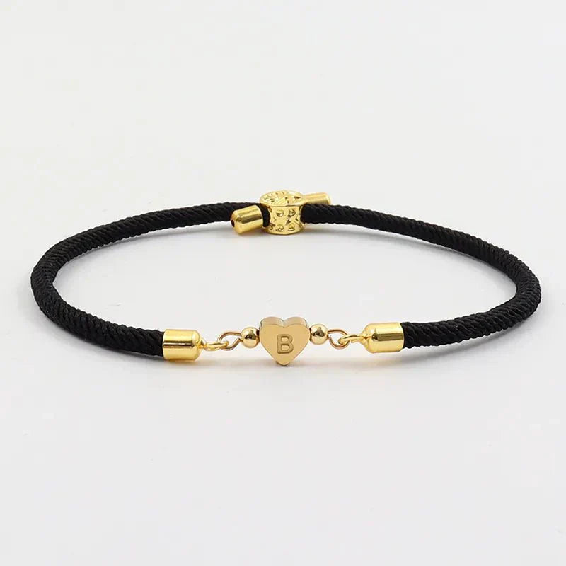 Pulseira com corda ajustável e pingente de coração com iniciais - Arianna