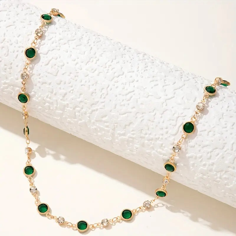 Tornozeleira dourada com cristais verdes - Amália