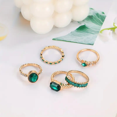 Conjunto de anéis de ouro com pedras de corte esmeralda - Jade