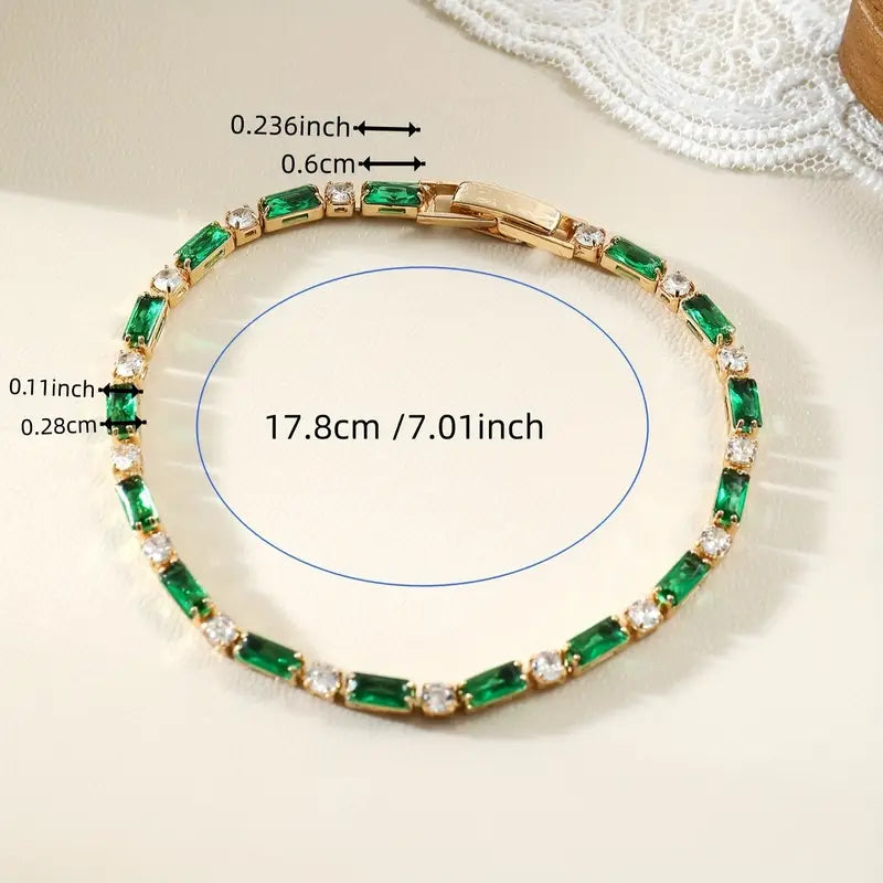 Pulseira dourada com pedras de corte esmeralda - Armonia