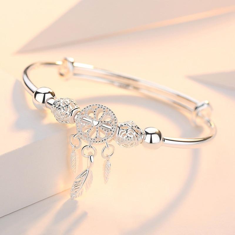 Pulseira rígida com pingente de sonho e pormenores esculpidos - Ismena