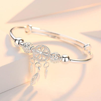 Pulseira rígida com pingente de sonho e pormenores esculpidos - Ismena